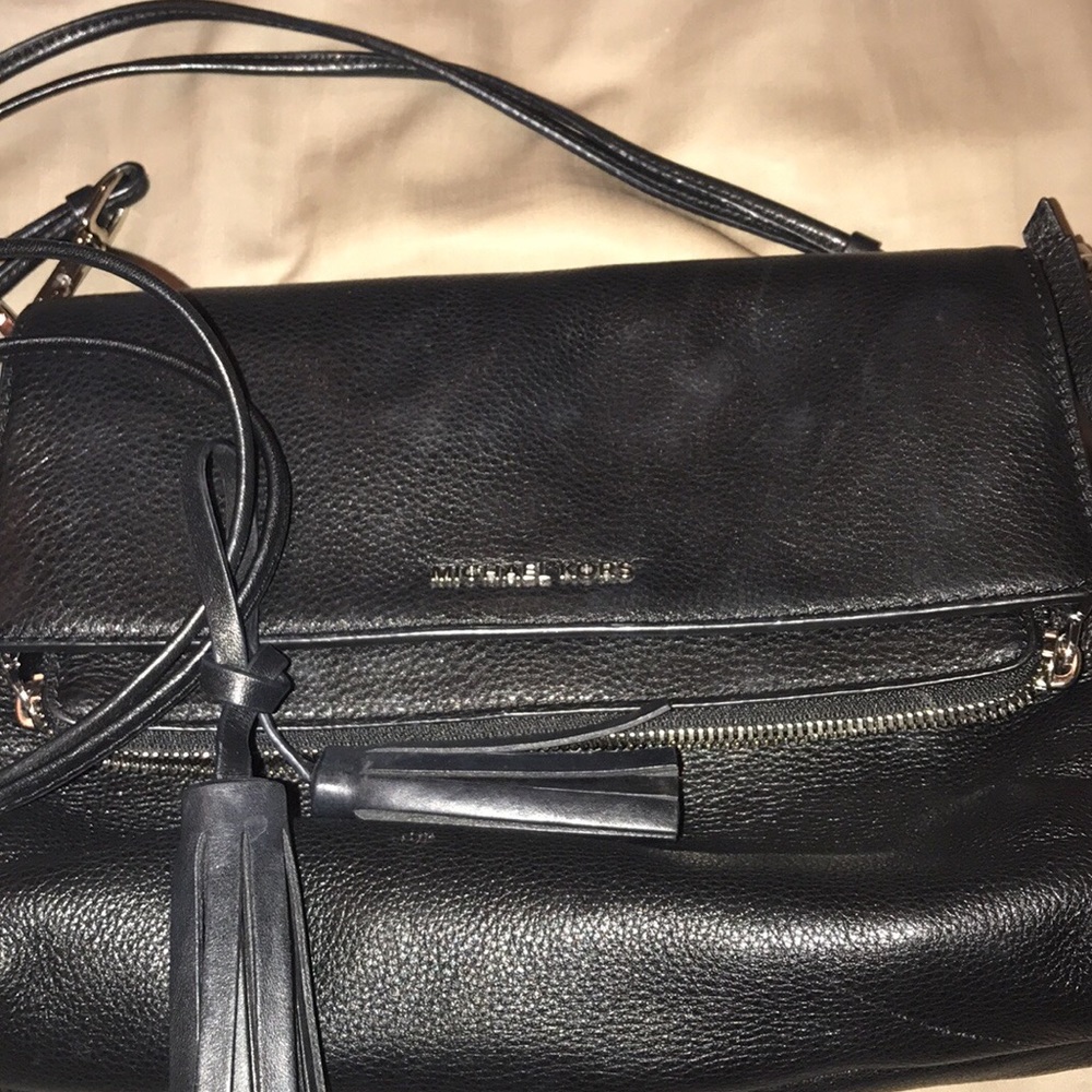 Black tri fold MK purse authentic